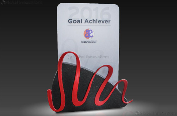 BinHendi Enterprises proudly accepts the �Goal Achiever Award' from Landscape Structures Inc.