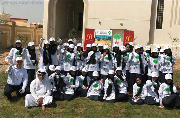 Al Manar Model School Students join McDonald's UAE and the Emirates Environment Group in an effort to �Plant a Greener Future'