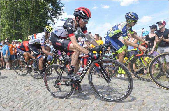 Martin Survives a Brutal Day of Racing on the Cobbles of Stage Nine