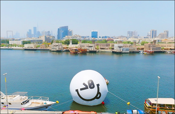 Wink, Wink! Mysterious Inflatable Emoji takes Dubai Creek by Storm  but What's the Big Secret?
