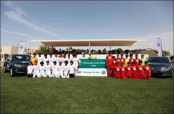 Al Nabooda Automobiles celebrates Al Jazira Club win at Volkswagen Junior Masters football tournament