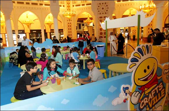 Kids have fun with paper at Modhesh Craftsville