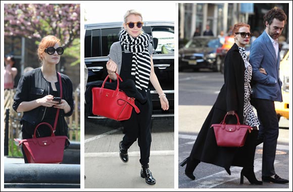 Jessica Chastain and Emma Roberts wearing the Longchamp Le Pliage� H�ritage, their new favorite handbag